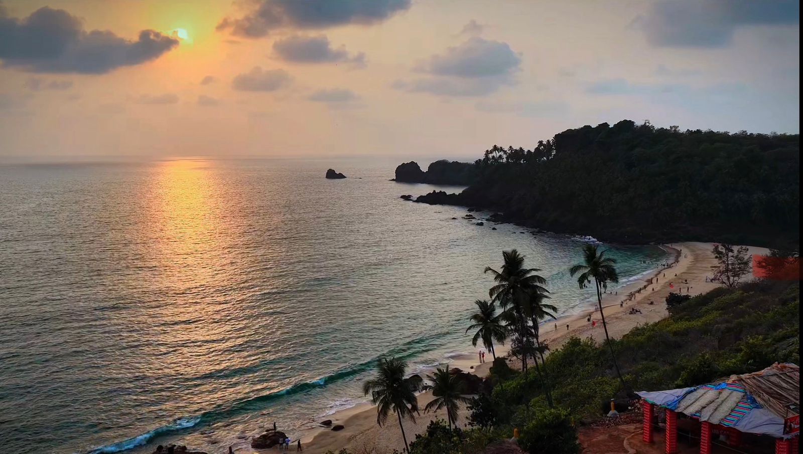 Drone in flight over Goa beach at golden hour